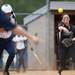 Allen Park sophomore Miranda Hebert throws to first on Saturday, June 8. Daniel Brenner I AnnArbor.com